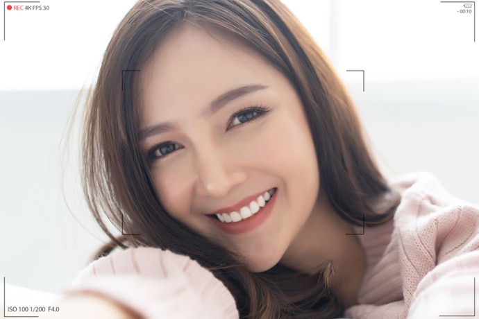 เลือกกล้องเซลฟี่จากคุณสมบัติการถ่ายภาพ